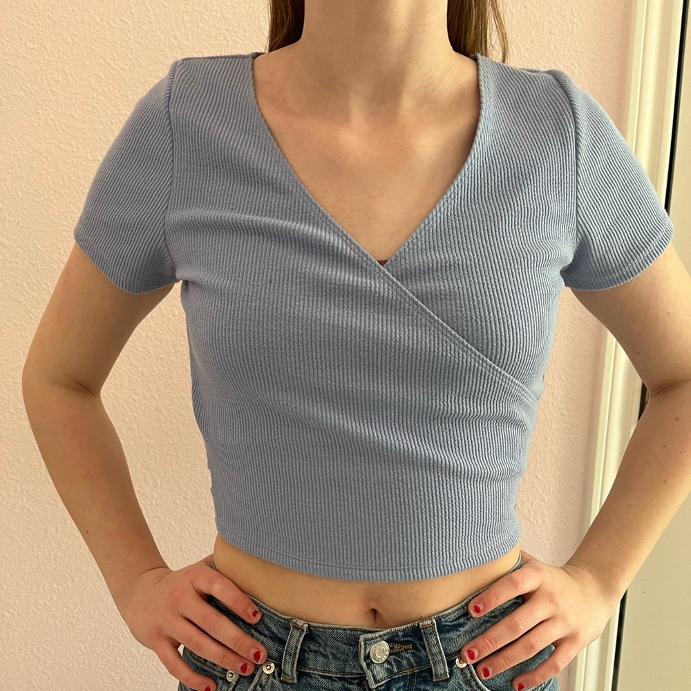 light blue hollister cross top